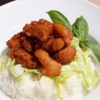  Crispy Honey Chicken Bowl · Crispy white meat chicken with cucumbers tossed in a flavorful honey garlic sauce medley ove...
