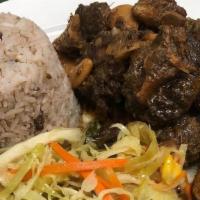 Oxtail · Braised in a hearty brown stew loaded with butter beans served with steam vegetables and any...