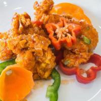 Fried Chicken Meal · Served with your choice of rice and a side