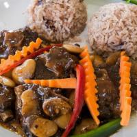 Oxtail Meal · Served with your choice of rice and a side