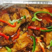 Stew Chicken Meal · Served with your choice of rice and a side