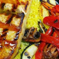 Grilled Tuna · With Greek salad and rice.