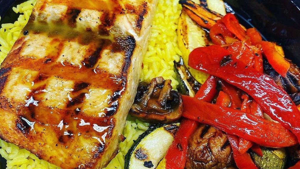 Grilled Tuna · With Greek salad and rice.