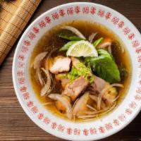 Chicken Pho Noodle Soup · Grilled chicken. Served with chicken broth soup, onions, scallions, and lemon, basil and bea...
