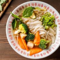 Vegetarian Pho Noodle Soup · Mixed vegetables. Served with vegetarian broth soup, onions, scallions, and lemon, basil and...