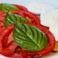 Mozzarella Di Bufala · with ripe tomatoes & basil