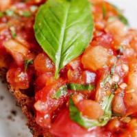 Bruschetta Of Tomatoes
 · classic Italian appetizer, toasted bread topped with fresh tomato and basil