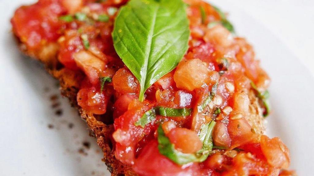 Bruschetta Of Tomatoes
 · classic Italian appetizer, toasted bread topped with fresh tomato and basil