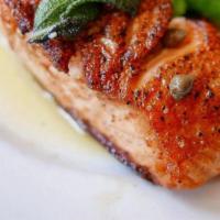 Seared Salmon
 · Served with lemon, capers, sage, arugula, and virgin olive oil.