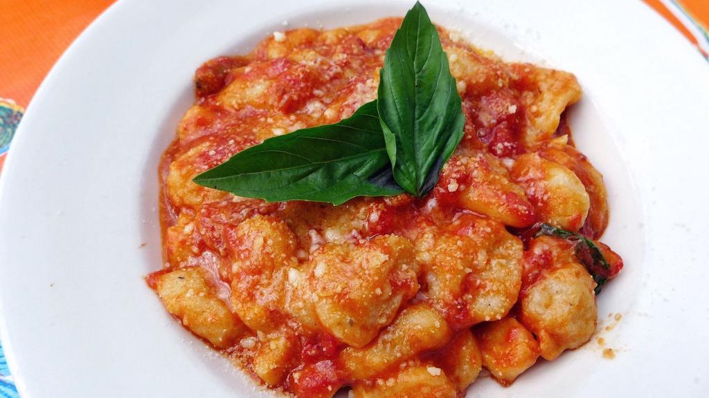Uncle Tony'S Gnocchi
 · With tomatoes, basil and parmigiano.