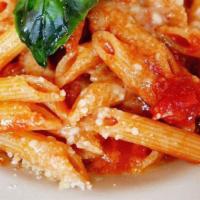 Penne · Topped with parmigiano.