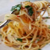 Spaghetti With Garlic
 · With extra virgin olive oil, topped with parmigiano.