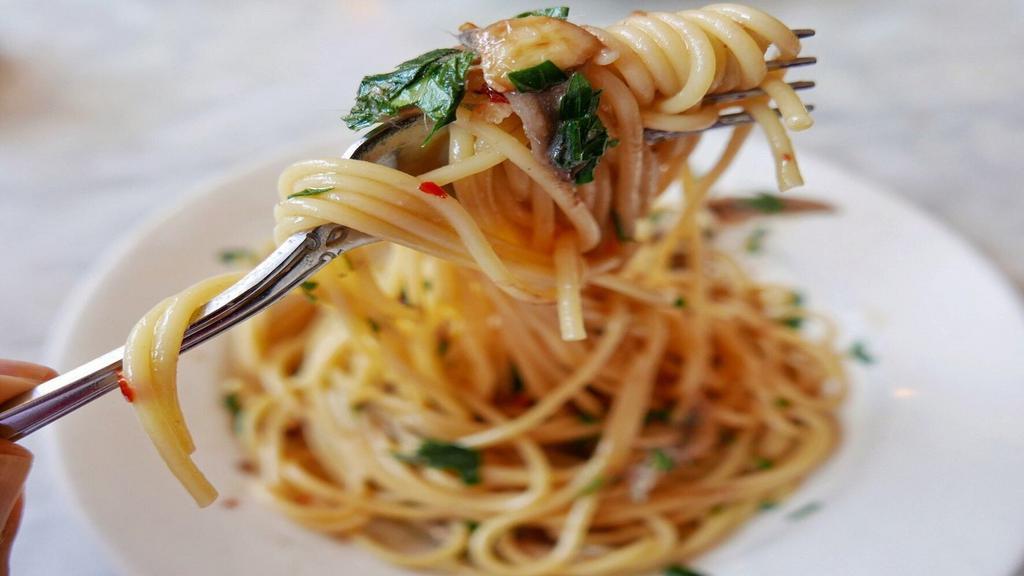 Spaghetti With Garlic
 · With extra virgin olive oil, topped with parmigiano.
