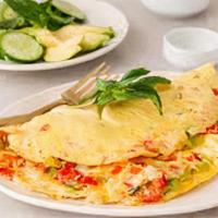 Veggie Omelette · Spinach, green peppers, mushroom, onion tomatoes and choice of cheese.  Topped with sliced a...