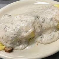 Rocky Mountain Omelette · Sausage, onions, green peppers and choice of cheese.  Topped with sausage gravy.