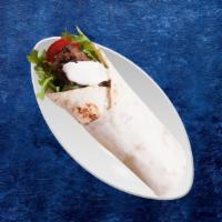 Kefta Gyro Wrap · Pita wrap filled with grilled lamb, diced onions, tomatoes, parsley, hummus and pickles,.