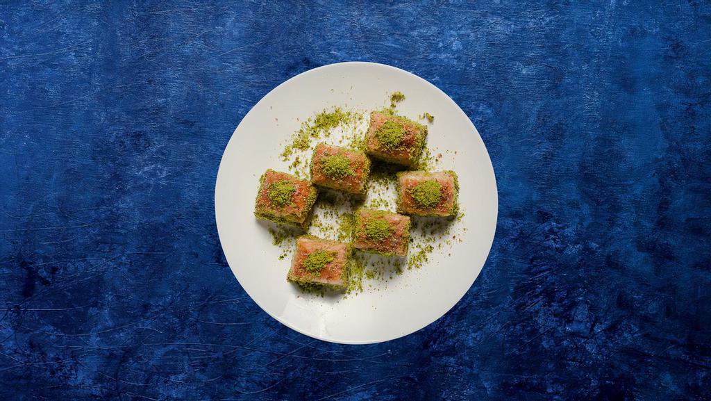 Baklava Boom! · Crisp filo layered pastry drizzled with syrup and garnished with fresh nuts