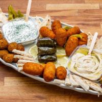Falafel Party Tray · Serves 8
Includes Falafel, vegetarian Kibbee, Tzatziki, Houmous, Pickles, stuffed grape leav...