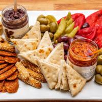 Hellenic Farms Party Tray · Serves 8
Includes one vegan fig salami, roasted red & green peppers,  pitted Kalamata and gr...