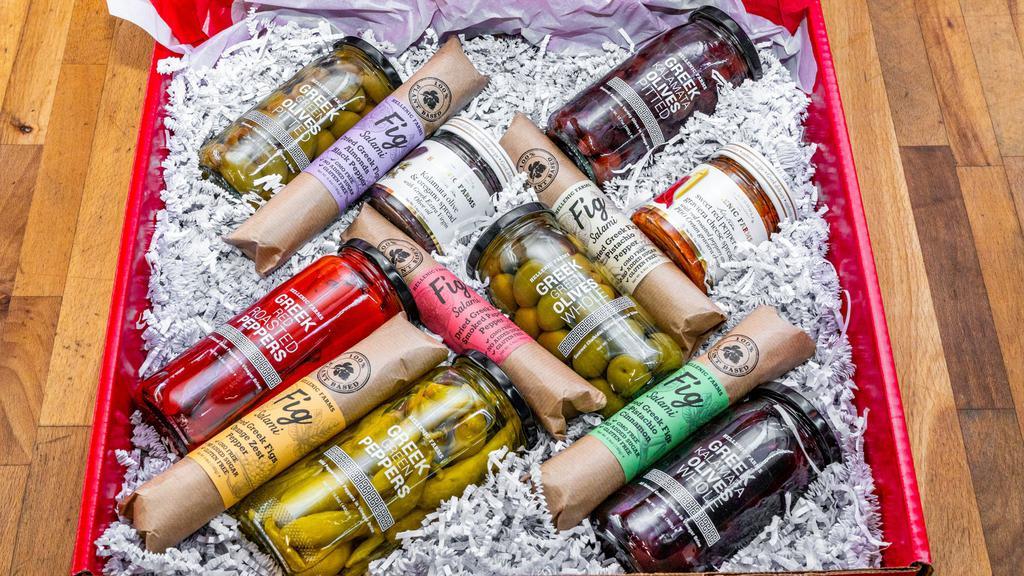 Hellenic Farms Gift Box · Hellenic Farms specialties: 
Five vegan fig salami / Four Greek olives / Two Greek peppers / Two Greek appetizers spreads.