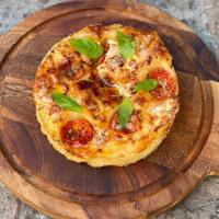 Focaccia Napoletana · tomato, mozzarella, calabrian oregano