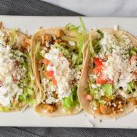 3 Tacos Regular · 3 Tacos with Choice of Filling, Onions and Cilantro on Soft Corn Tortilla, chicken, steak, g...