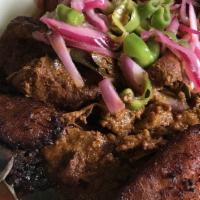 Cochinita Pibil · Yucatan Style Achiote Pulled Pork with Pickled Habanerro- Red Onions and Sweet Plantains