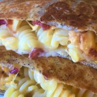 Mac & Cheese Crêpe · Creamy & delicious with Fusilli Pasta in our own Homemade velveeta cheese sauce, with bacon!