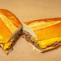 Philly Cheese Steak · BEEF AND WHITE CHEESE  WITH GRILLED ONION & PEPPER ON THE HERO WITH MAYO