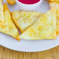 Crab Rangoon (Cheese Wonton) · Cream Cheese filling, no meat.   Served with sweet and sour dipping sauce.