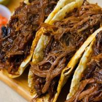 Pulled Beef Taco (3) · Soft mini tacos with pulled BBQ beef, cubed salad and guacamole