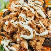Grilled Chicken Caeser Salad · Mixed greens, cucumbers, shredded carrots, roasted mushrooms, cherry tomatoes, crispy bissli...