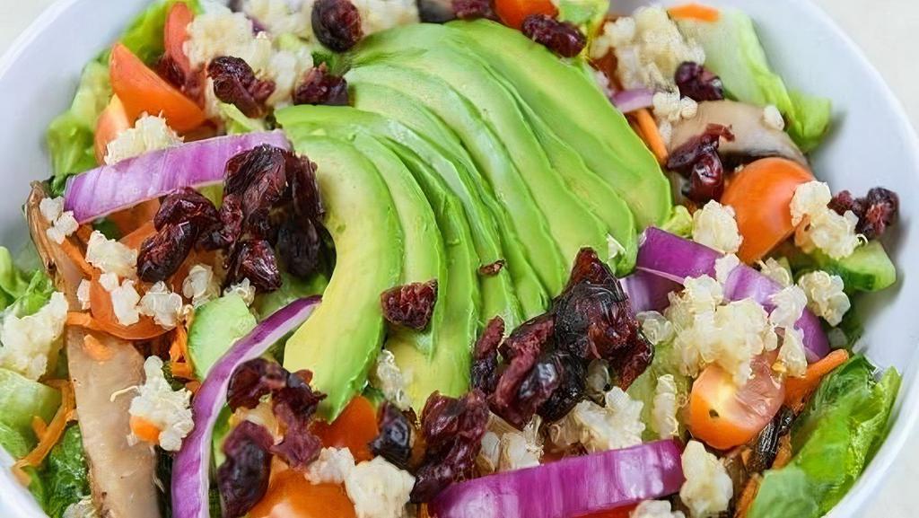 Healthy Quinoa Salad · Mixed greens, sweet potatoes, portobello mushrooms, shredded carrots, cucumbers, cherry tomatoes, red onions, cranberries, topped with avocado in italian dressing