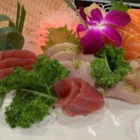 American Sashimi · 5 pieces tuna, 5 pieces salmon, and 5 pieces yellowtail.