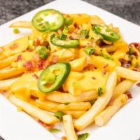Ryan'S Loaded Fries · Topped with Monterey Jack and cheddar cheese, bacon, jalapeños and green onions.