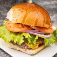 Cheeseburger · Hand made burger served W/lettuce n tomatoes n pickles