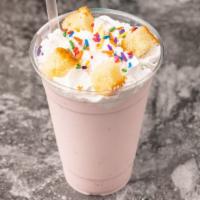 Biscochito Milkshake · Strawberry ice cream, pound cake, strawberry syrup and whipped cream.