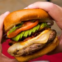 Avocado Burger · Seven oz. burger with bacon, sliced avocado, lettuce, tomato, onion, Monterey and Cheddar ch...