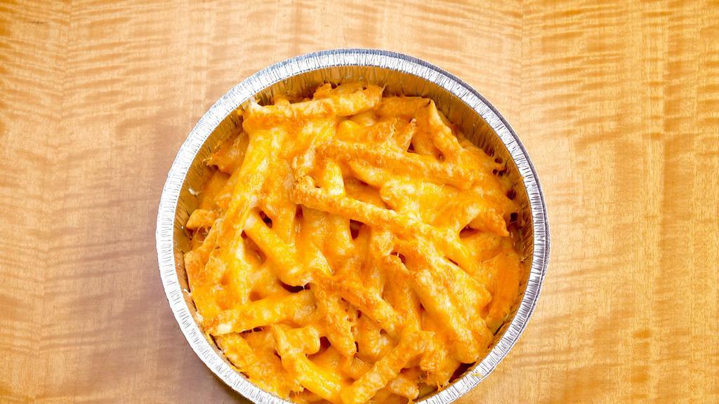 Cheese Fries · Crispy Fries smothered in melted Monterey & Cheddar cheese
