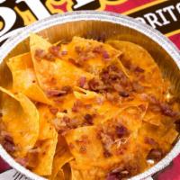 Loaded Nachos · Nachos with melted Monterey/cheddar cheese, bacon, and a side of ranch dressing.