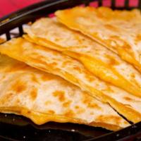Cheese Quesadilla · Melted Monterey/cheddar inside a warm tortilla, served with a side of sour cream.