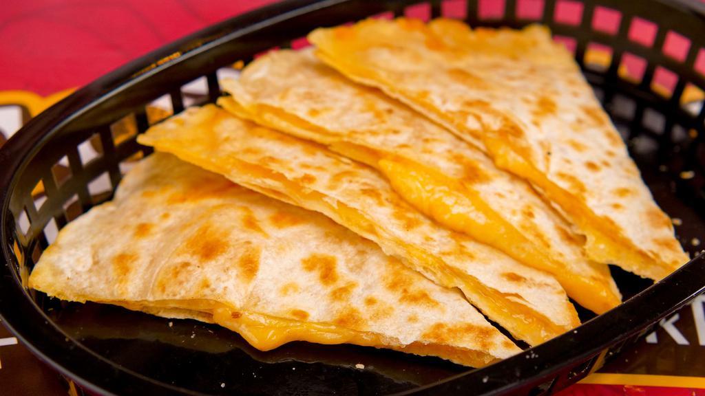 Cheese Quesadilla · Melted Monterey/cheddar inside a warm tortilla, served with a side of sour cream.