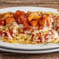 Chicken Parmigiana · with spaghetti.