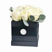 Box Of Roses · 1 dozen brilliant fresh white roses sits beautifully in a re-usable black box adorned with s...