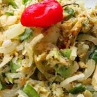 Saltfish · Saltfish sautéed with onions, scotch bonnet pepper, tomatoes, and spices.