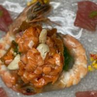 Umami · Diced Ora King Salmon, Jumbo Lump Crab Meat, Seaweed Salad Tossed in a White Miso Glaze Dres...