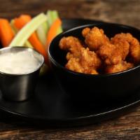 Cajun · 8 boneless wings tossed in Cajun dry rub (mild heat), served with carrots & celery and a dip...