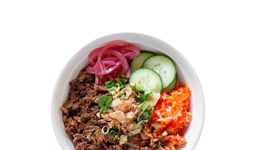 #4B Beef Bulgogi Bowl · Korean-style, thin cut marinated ribeye beef. - bowls come with pork house sauce, kimchi, pickled red onions, fresh cucumber, pickled daikon & carrots, fresh cilantro, and fried shallots
Please notify a staff if you have dietary restrictions or allergies.