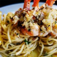 Shrimp Scampi With Linguine · Jumbo shrimp with garlic, lemon in a white wine sauce.