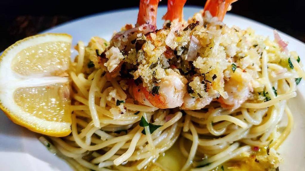 Shrimp Scampi With Linguine · Jumbo shrimp with garlic, lemon in a white wine sauce.